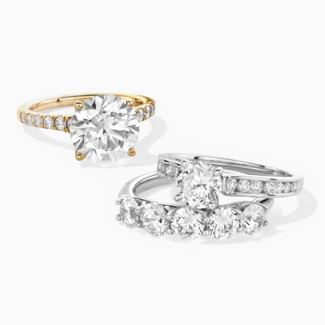 Two diamond rings from the Kay Signature Collection.