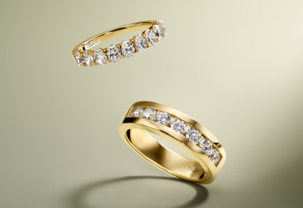 Two gold The LEO wedding rings