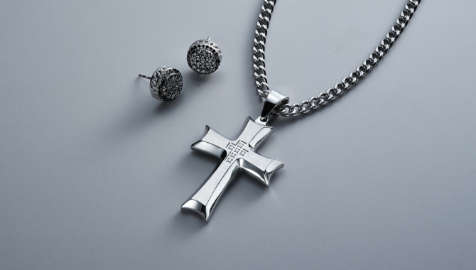 Mens stud earrings and silver cross chain necklace