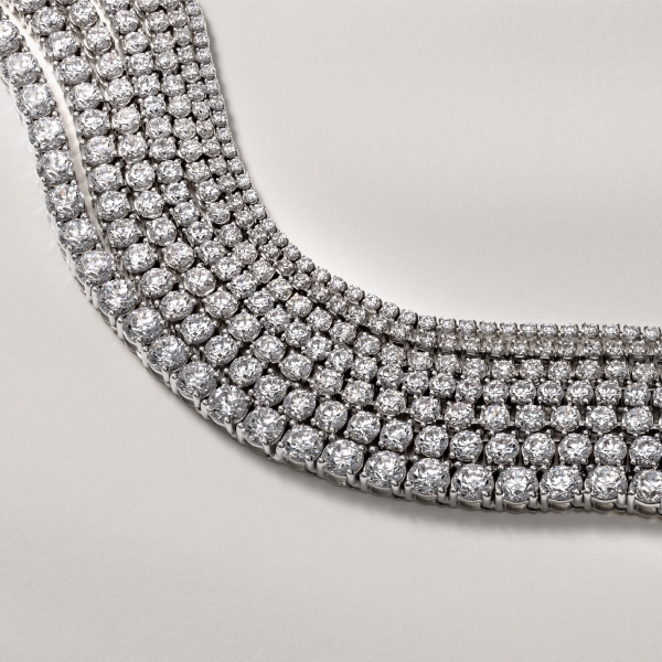 Several diamond tennis bracelets