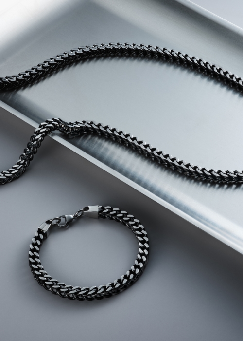 A black chrome chain and matching bracelet.