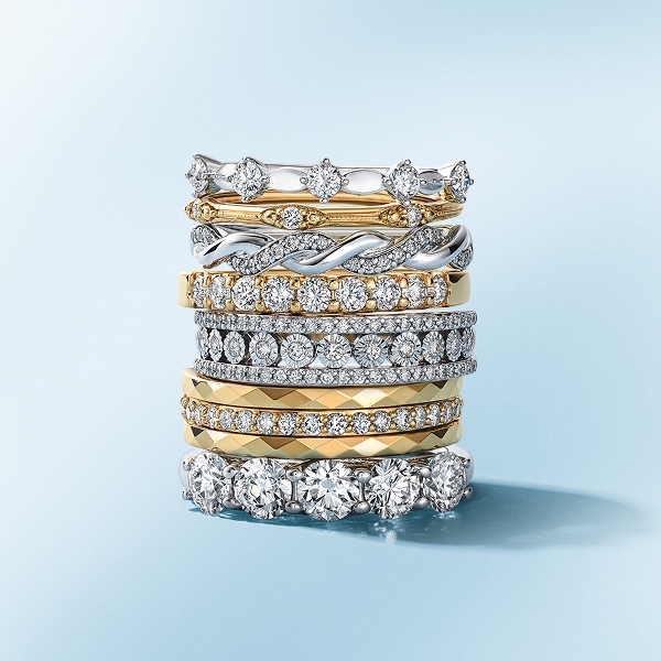A group of various gold and silver stacking rings by KAY
