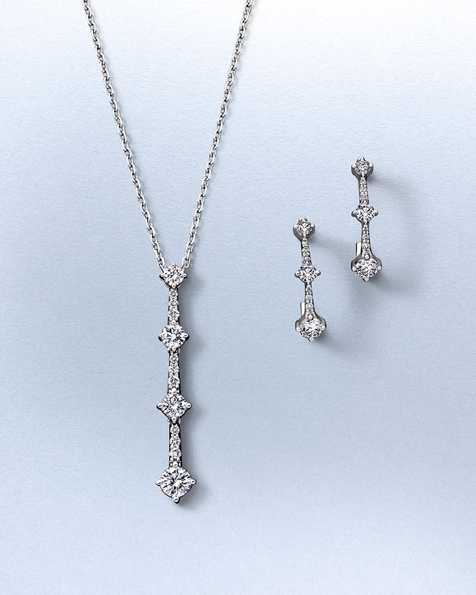 Various gold and silver, diamond studded jewelry pieces from KAY.