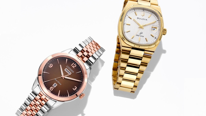 Men wearing gold plate watch with diamond bracelet and gold ring