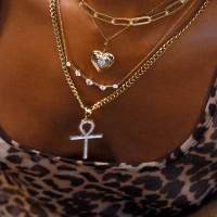 woman wearing necklaces
