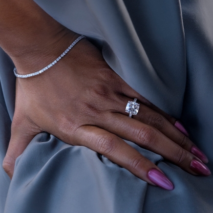 Woman wearing diamond engagement ring