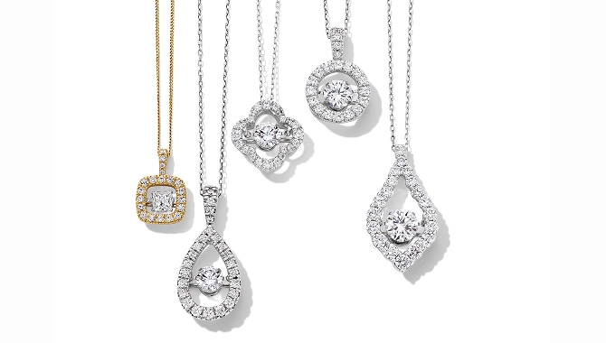 Gold and silver diamond necklaces.