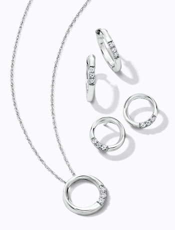 Gold, diamond and gemstone stacked rings