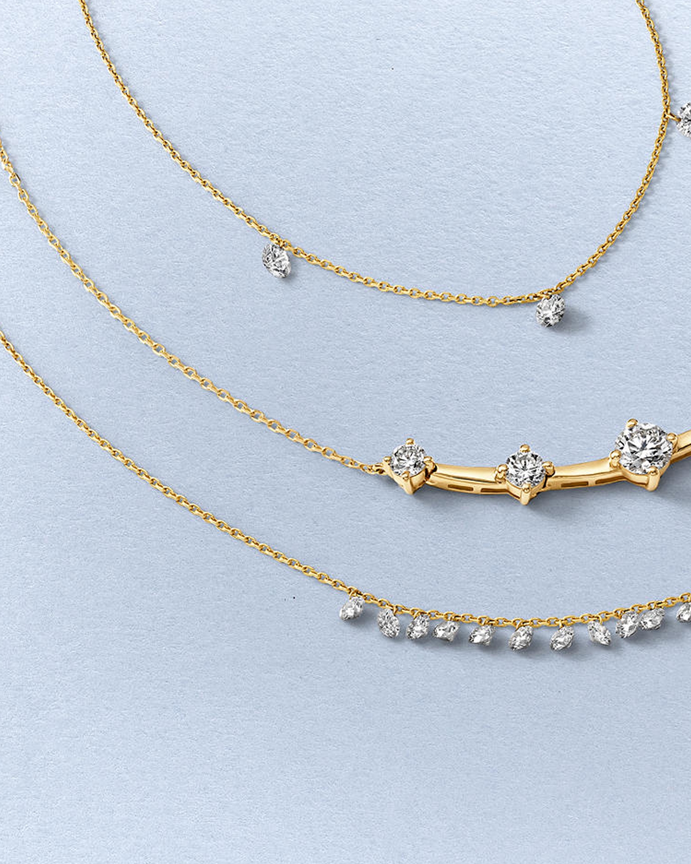Yellow gold and diamond necklaces from KAY
