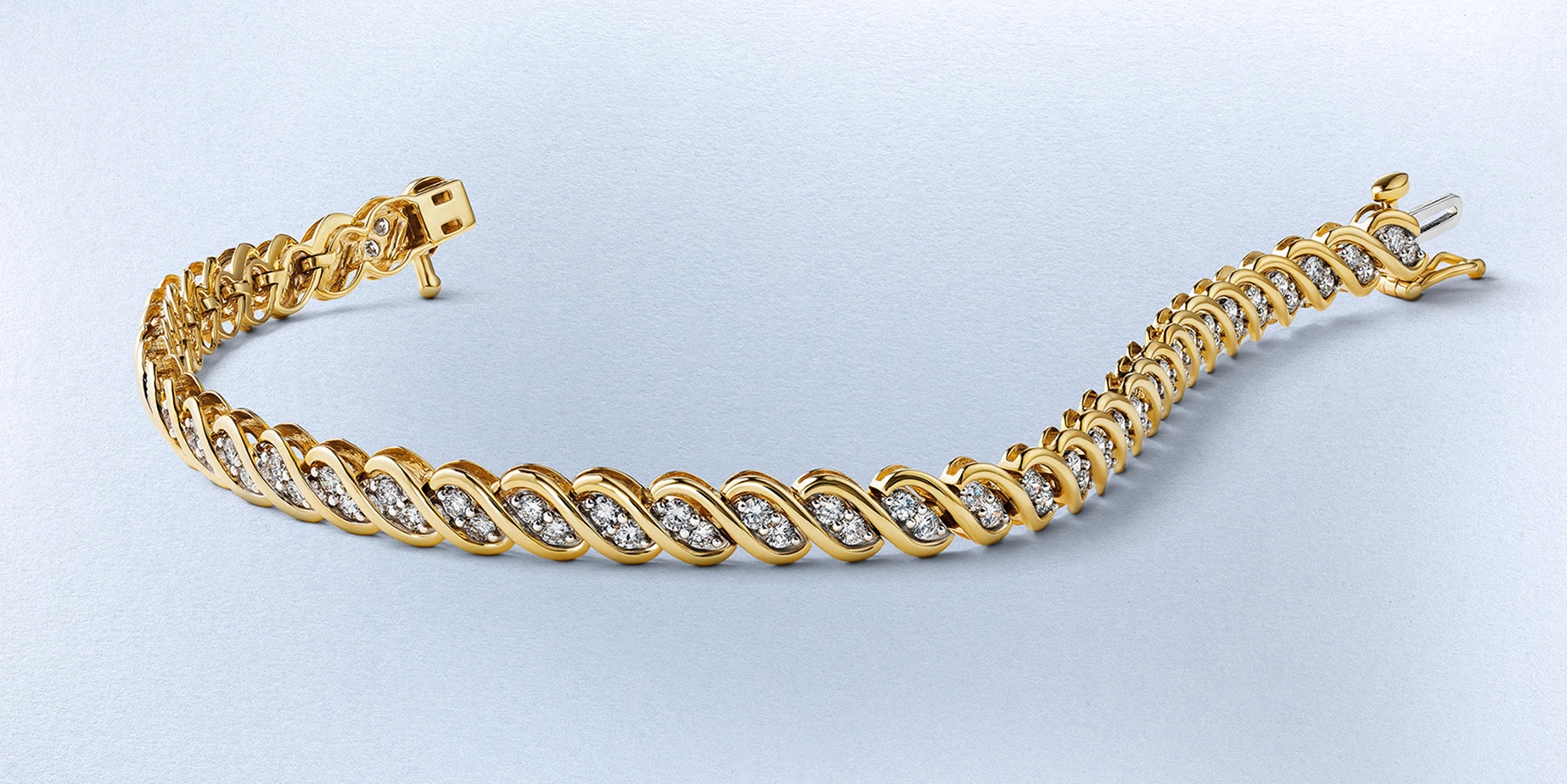 Gold and diamond bracelets from KAY
