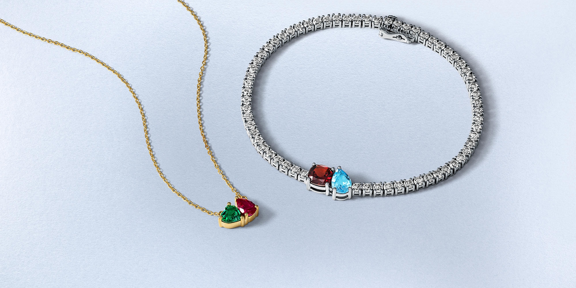 Gold birthstone necklace and white gold birthstone bracelet from KAY