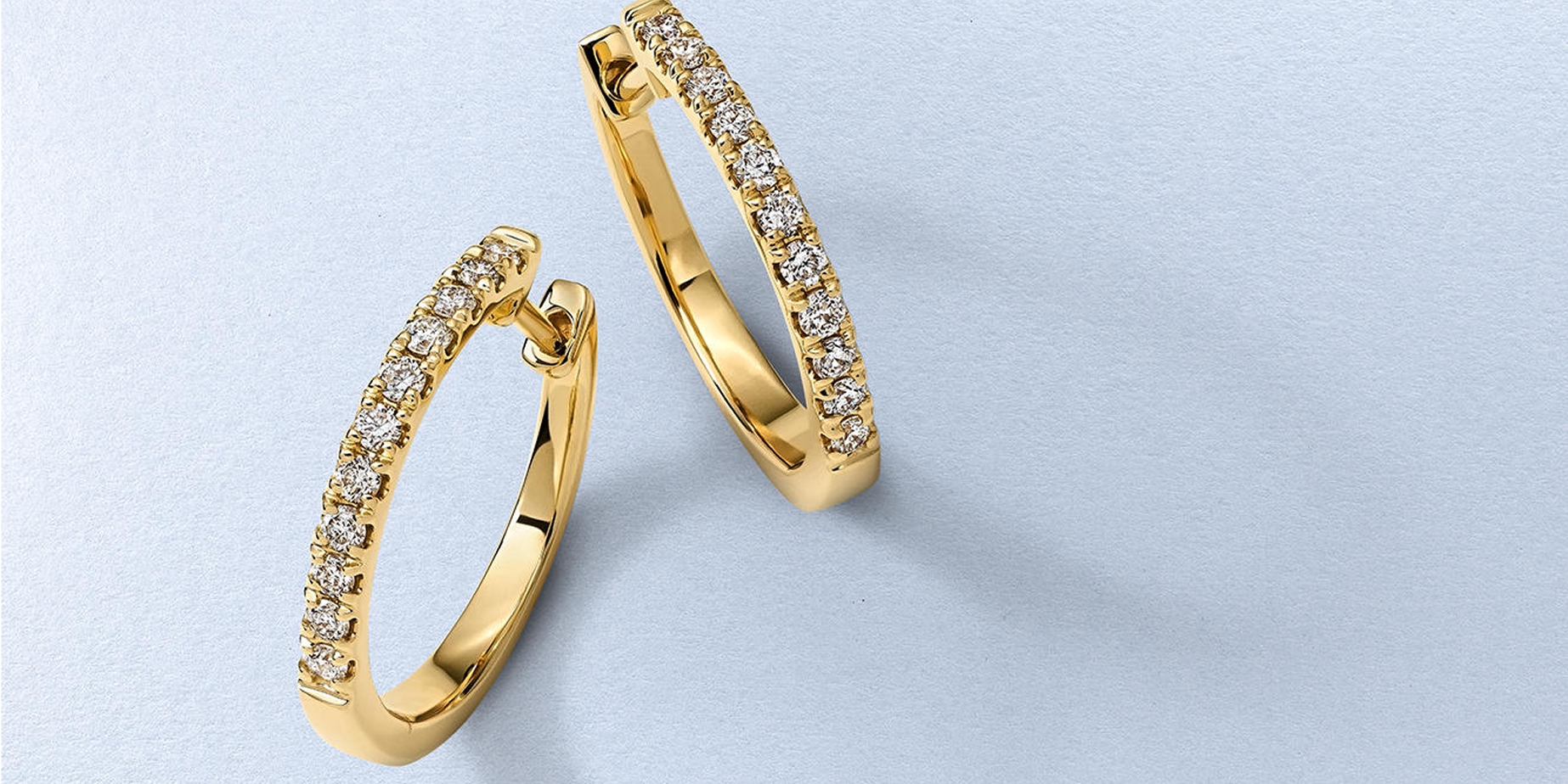 Gold and diamond hoops from KAY