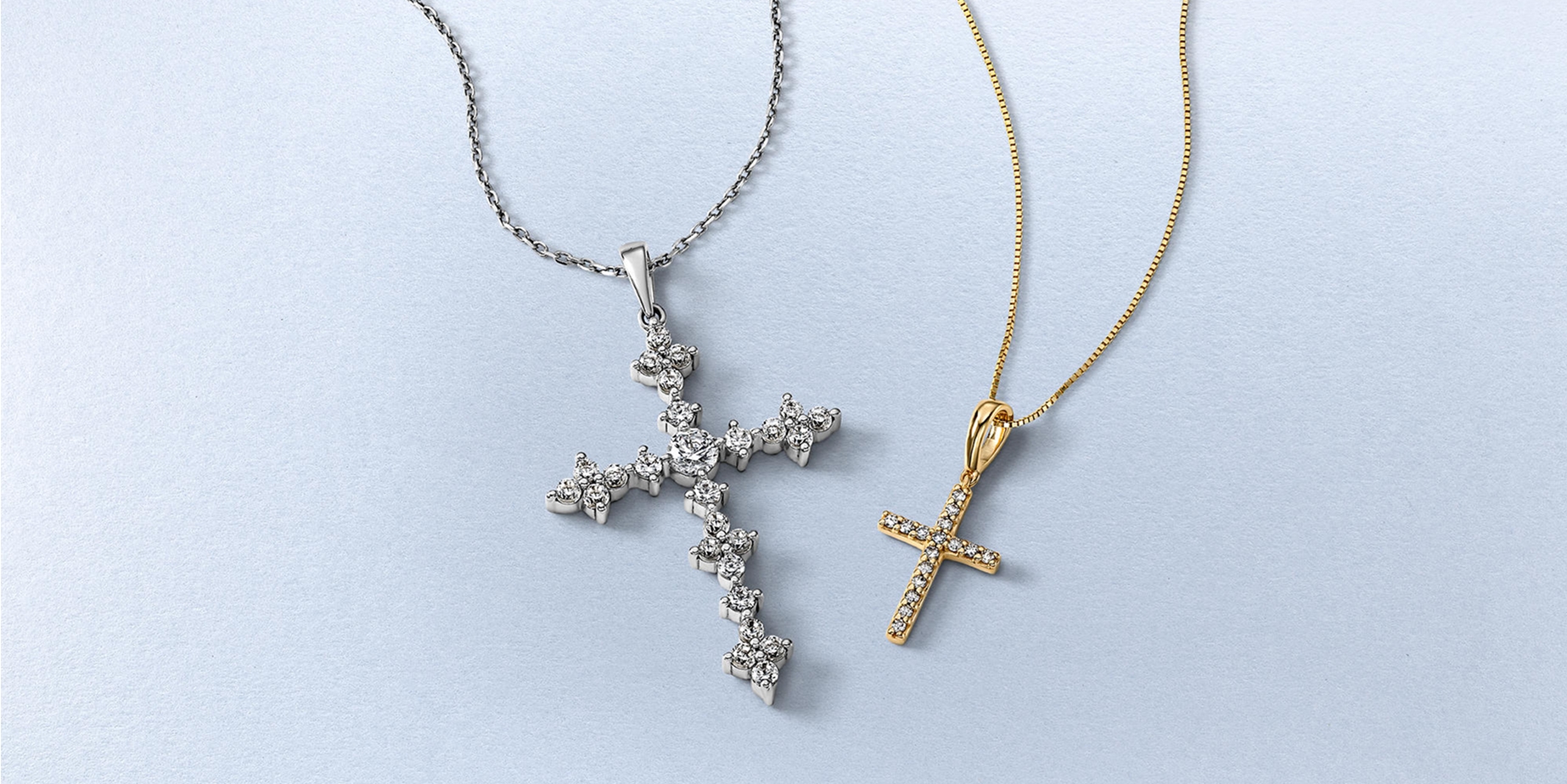 White and yellow gold diamond cross necklaces from KAY