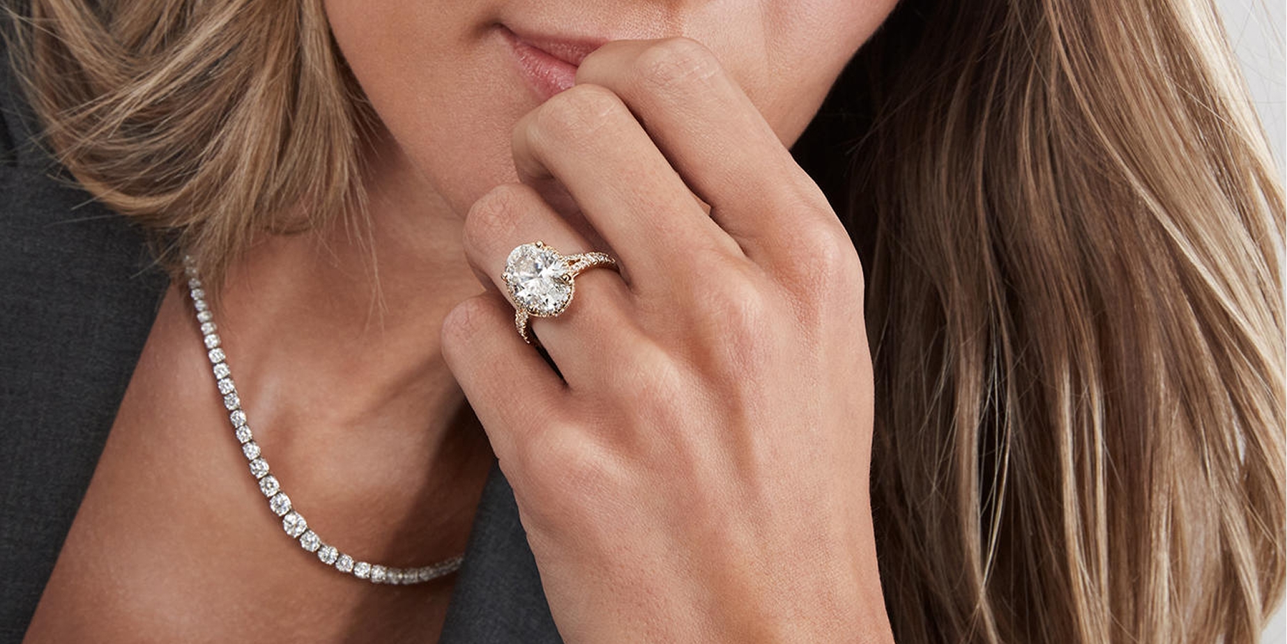 Woman wearing KAY Signature diamond jewelry from KAY