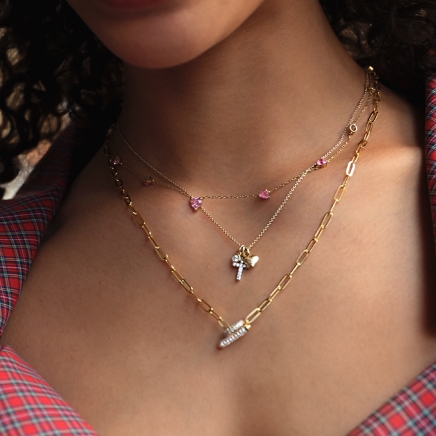 Image of family looking at Kay gift box