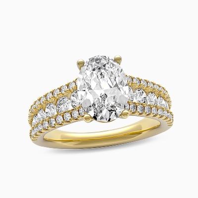 Image of gold oval side accent engagement ring
