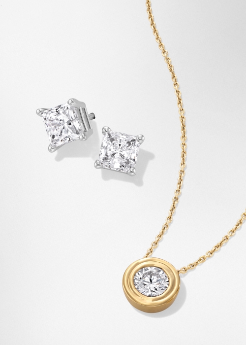 Princess diamond solitaire stud earrings and round diamond solitaire necklace