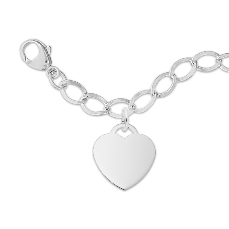 Mother wearing gold charm bracelet