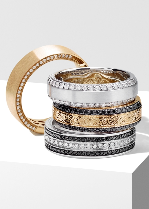 Stack of Neil Lane wedding bands for him