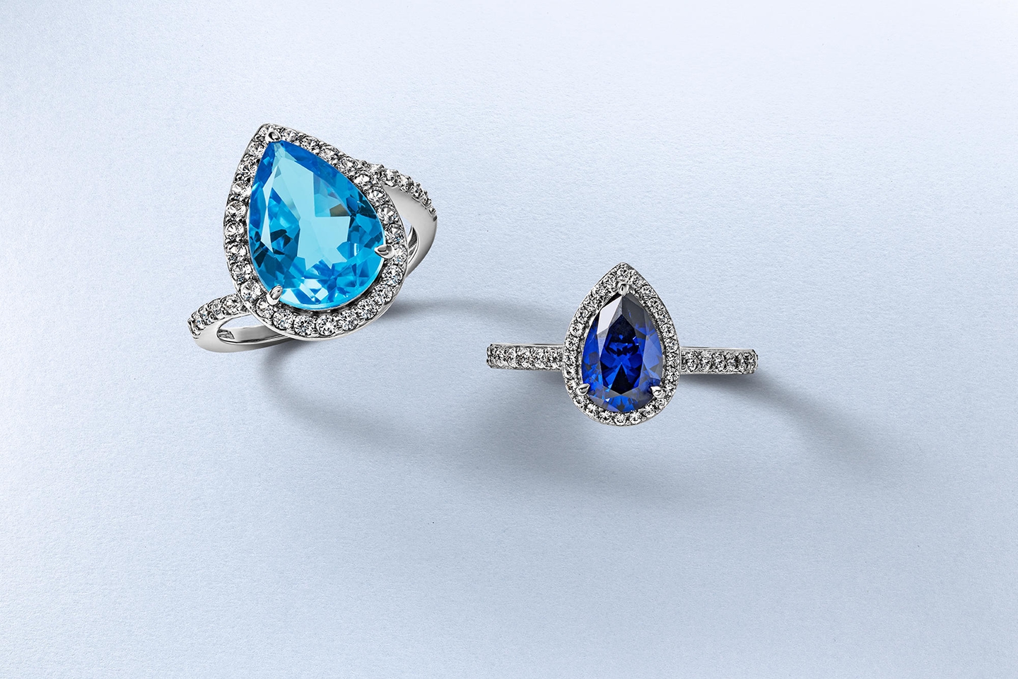 Blue topaz pear ring and sapphire pear ring