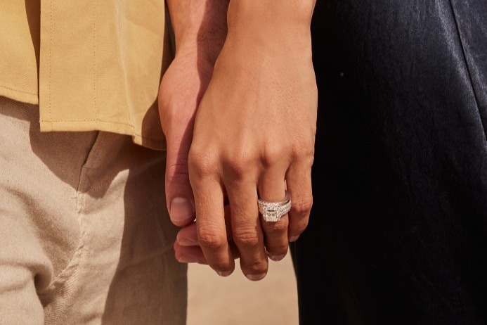 Image of couple holding hands