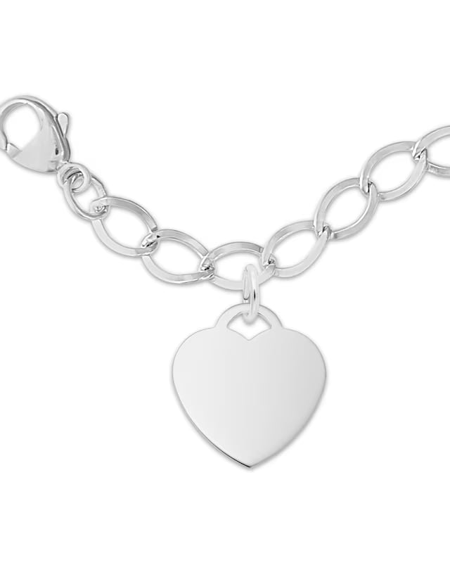 Mother wearing gold charm bracelet