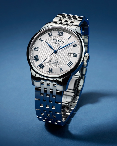 Tissot Le Locle watch on blue background