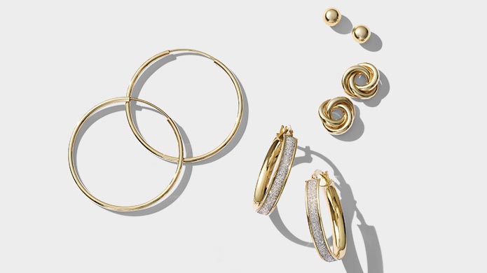 Image of several yellow gold earring styles