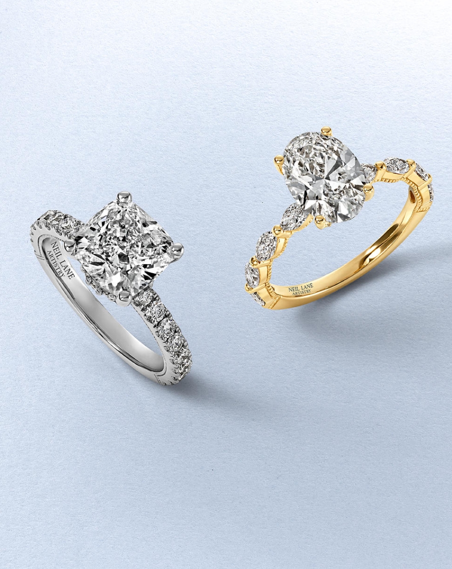 Kay Neil Lane Artistry lab-grown diamond engagement rings featuring an oval-cut diamond in yellow gold and a princess-cut diamond in white gold, accented with pavé diamonds and designer-inspired craftsmanship.